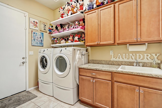 9316 Iron Creek Ln NW, Albuquerque, NM 87120 - washroom featuring independent washer and dryer, cabinet space, and light tile patterned flooring