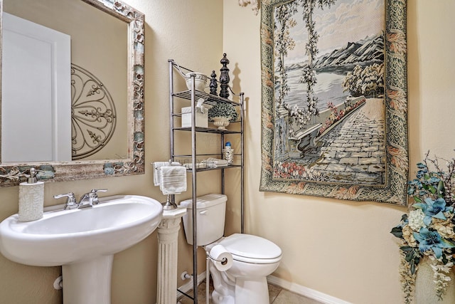 9316 Iron Creek Ln NW, Albuquerque, NM 87120 - half bathroom featuring toilet and tile patterned flooring