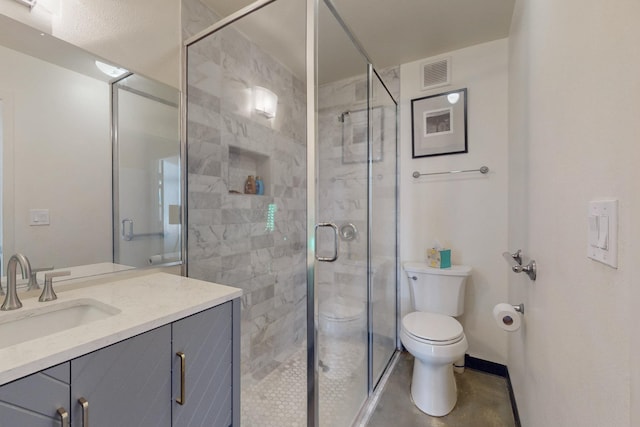 full bath featuring vanity, baseboards, visible vents, a stall shower, and toilet