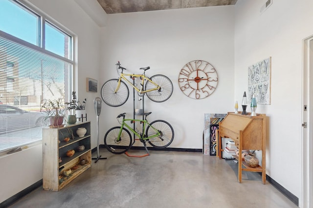 garage featuring visible vents and baseboards