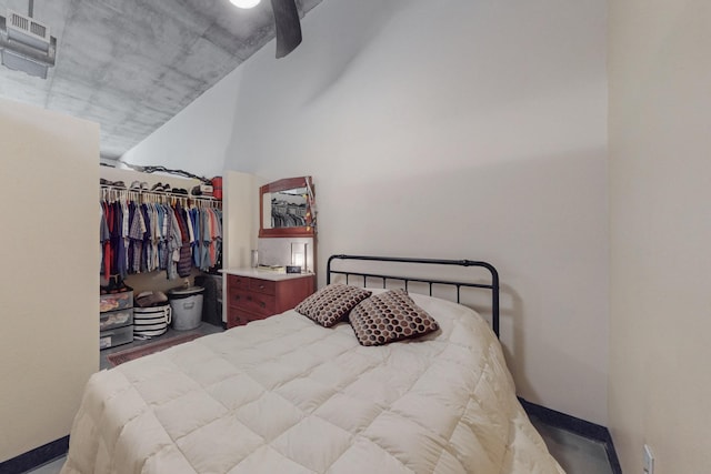 bedroom featuring a closet, visible vents, baseboards, and ceiling fan