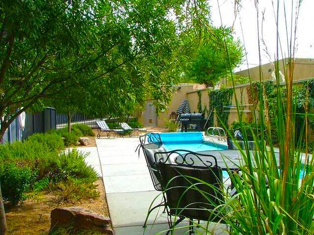 view of swimming pool with a fenced in pool, a patio, and fence