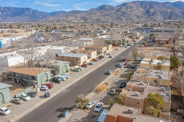 birds eye view of property featuring a mountain view