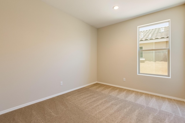 2178 Janet Way, Rio Rancho, NM 87144 - unfurnished room featuring light carpet, baseboards, and recessed lighting