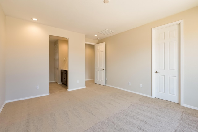 2178 Janet Way, Rio Rancho, NM 87144 - unfurnished bedroom featuring light carpet, baseboards, recessed lighting, and ensuite bathroom