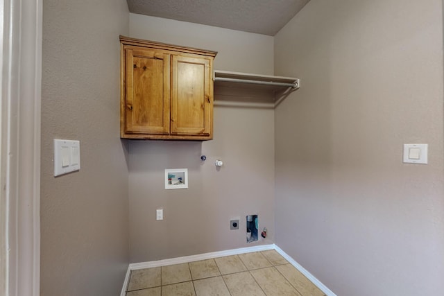 washroom featuring baseboards, washer hookup, electric dryer hookup, and hookup for a gas dryer