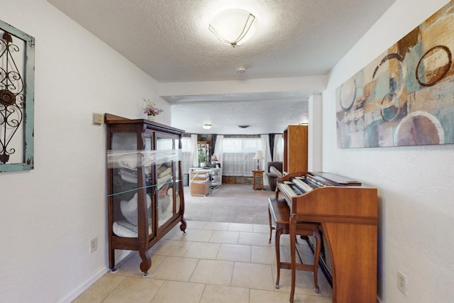 corridor with a textured ceiling