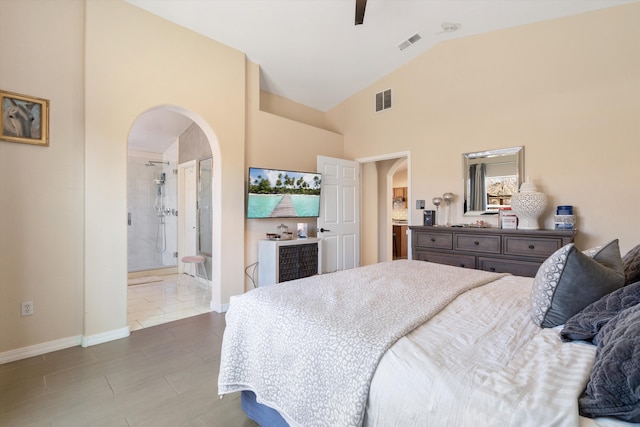 bedroom featuring arched walkways, visible vents, and baseboards