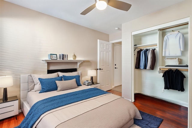 bedroom featuring a closet, a ceiling fan, and wood finished floors