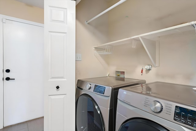 laundry room featuring laundry area and washer and clothes dryer