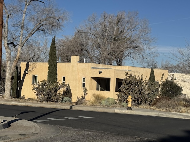 view of front of home with stucco siding