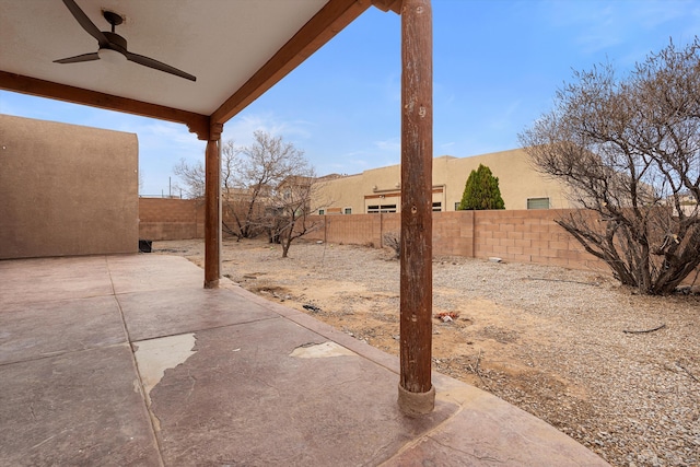 view of patio with ceiling fan and a fenced backyard