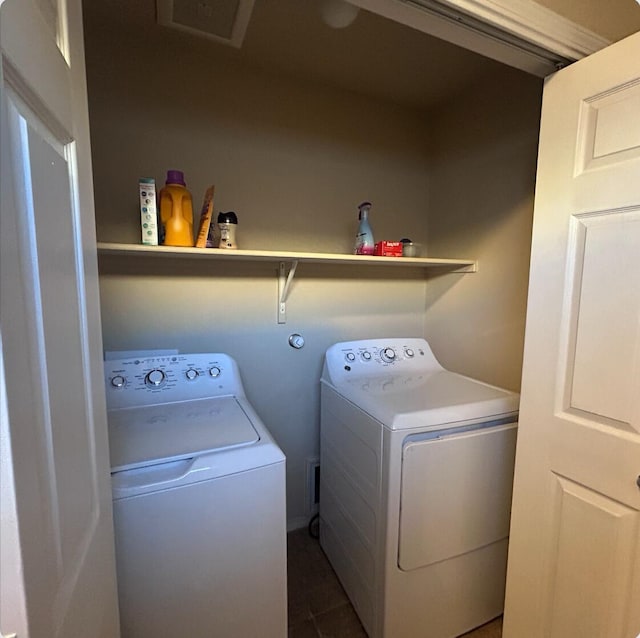 laundry area with laundry area and washer and dryer