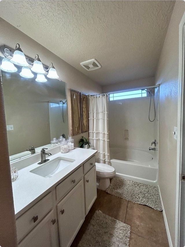 full bath featuring visible vents, toilet, shower / bath combo, a textured ceiling, and vanity