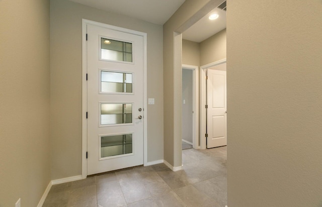 entryway with visible vents and baseboards