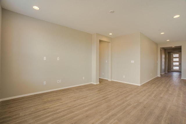6209 Angelou Ln NW, Albuquerque, NM 87120 - unfurnished room featuring light wood-style floors, recessed lighting, and baseboards