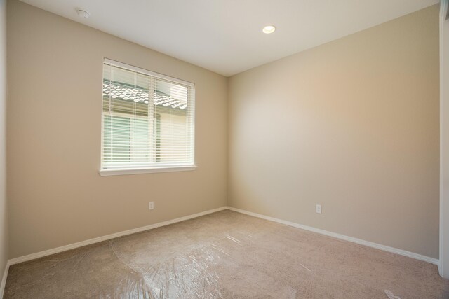 6209 Angelou Ln NW, Albuquerque, NM 87120 - carpeted spare room featuring baseboards and recessed lighting