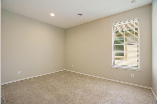 6209 Angelou Ln NW, Albuquerque, NM 87120 - carpeted empty room featuring baseboards, a smoke detector, and recessed lighting