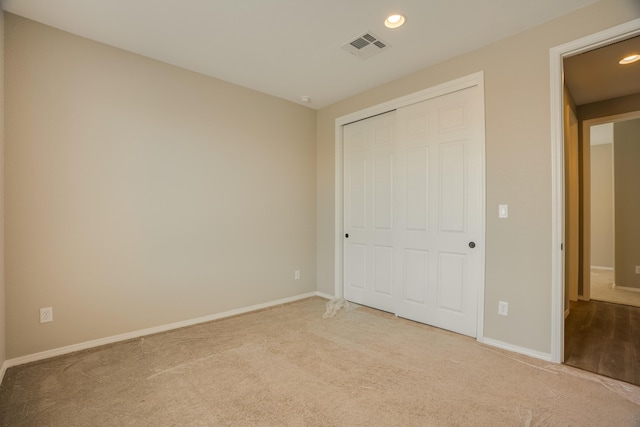 6209 Angelou Ln NW, Albuquerque, NM 87120 - unfurnished bedroom featuring recessed lighting, carpet floors, baseboards, and a closet