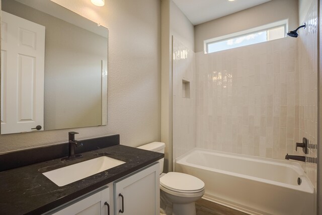 6209 Angelou Ln NW, Albuquerque, NM 87120 - bathroom featuring vanity, toilet, and washtub / shower combination
