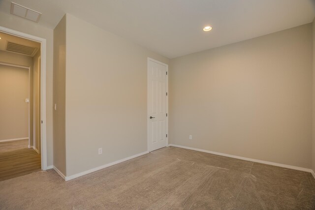 6209 Angelou Ln NW, Albuquerque, NM 87120 - carpeted empty room featuring baseboards and recessed lighting