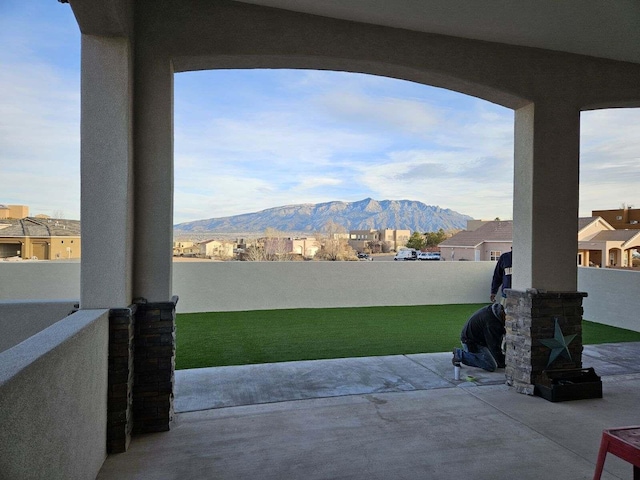 view of patio featuring a mountain view