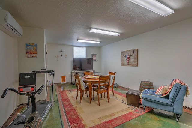 dining area featuring a textured ceiling, baseboards, and an AC wall unit