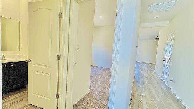5030 Grace St, Los Lunas, NM 87031 - hall featuring light wood-style floors and baseboards