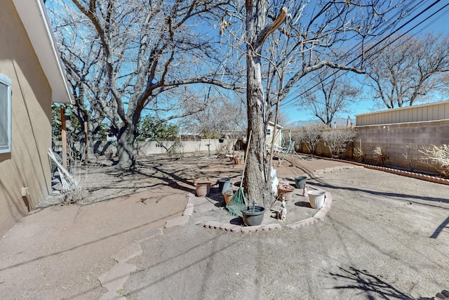 view of yard with a patio area and a fenced backyard