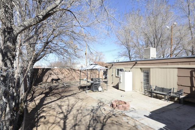 exterior space with a patio and fence