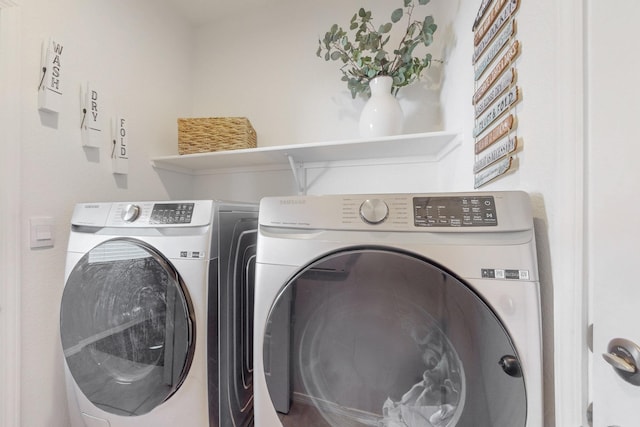 laundry area featuring laundry area and washing machine and dryer