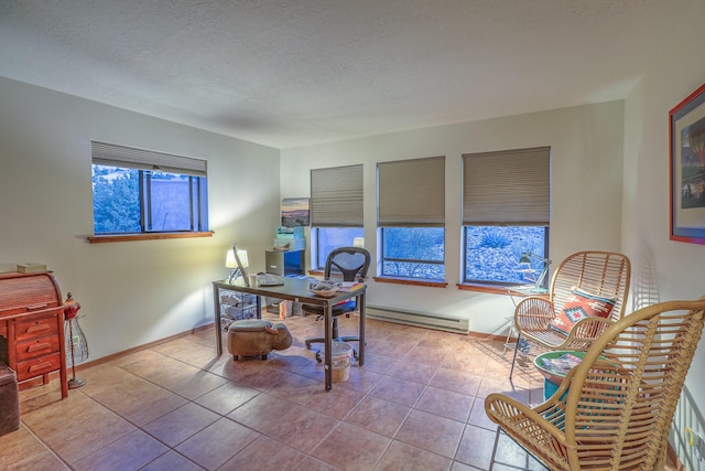 tiled office space with a baseboard radiator, a textured ceiling, and baseboards