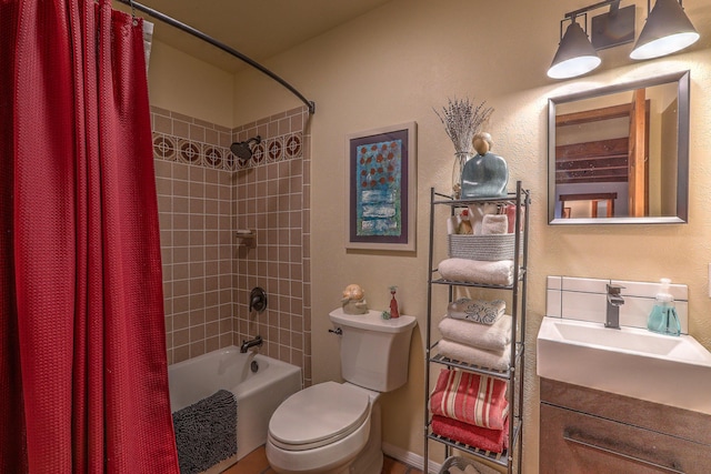 full bathroom with shower / tub combo, vanity, and toilet