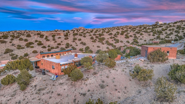 view of aerial view at dusk