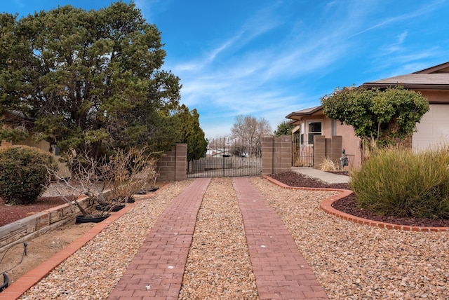 exterior space with a gate and fence