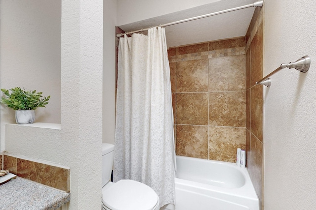 full bathroom with a textured wall, shower / bath combination with curtain, and toilet