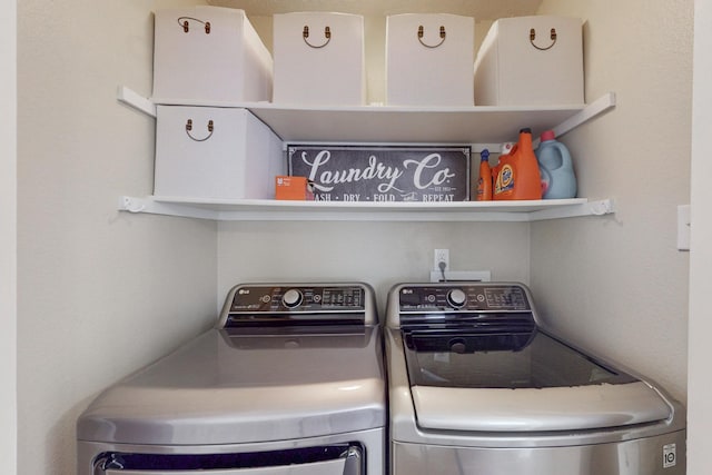 laundry room featuring laundry area and washing machine and clothes dryer