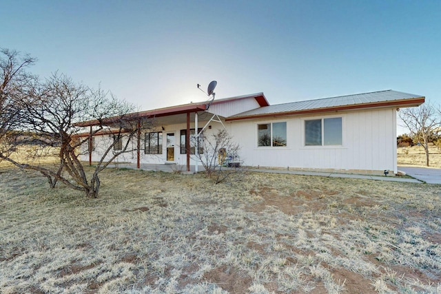 view of front of house featuring metal roof