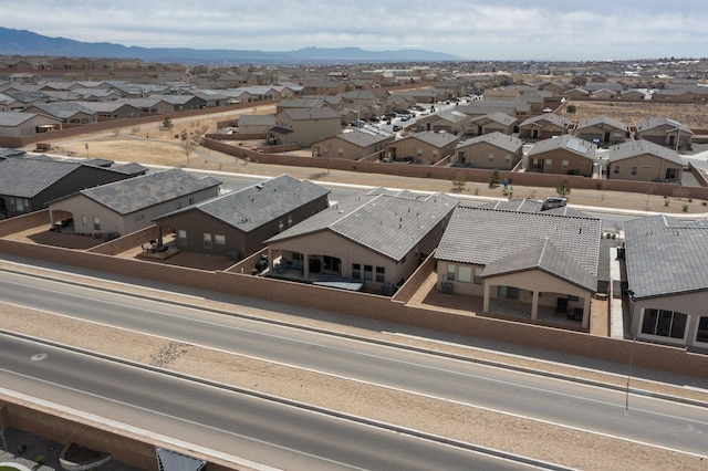 bird's eye view featuring a mountain view and a residential view