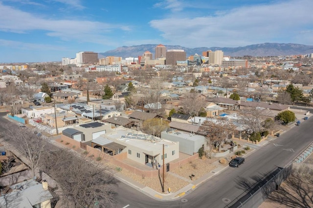 aerial view with a view of city and a mountain view