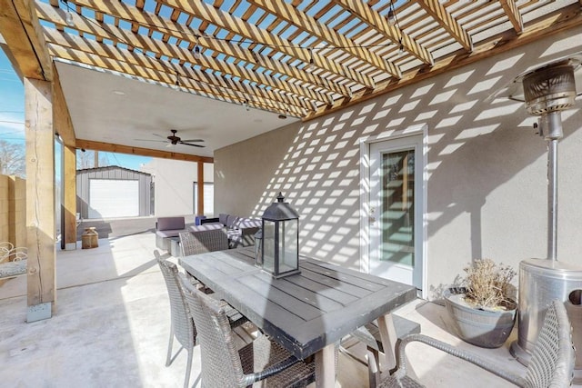 view of patio featuring outdoor dining space, an outdoor living space, a pergola, and an outdoor structure