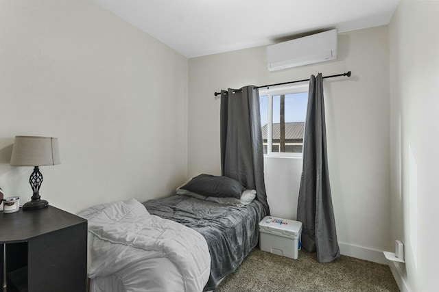 carpeted bedroom with an AC wall unit and baseboards