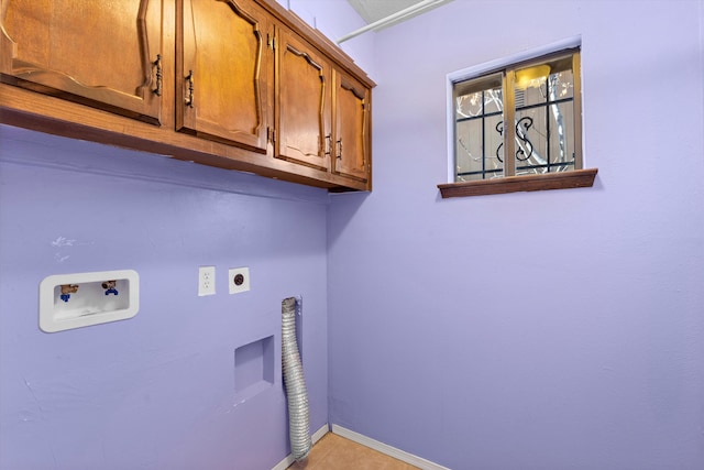 laundry area featuring baseboards, washer hookup, cabinet space, and hookup for an electric dryer