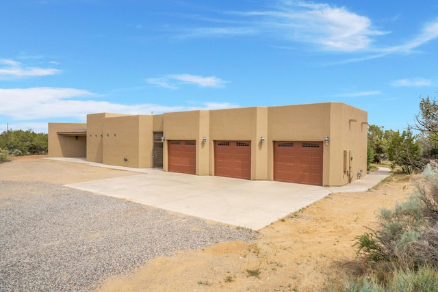 garage featuring driveway