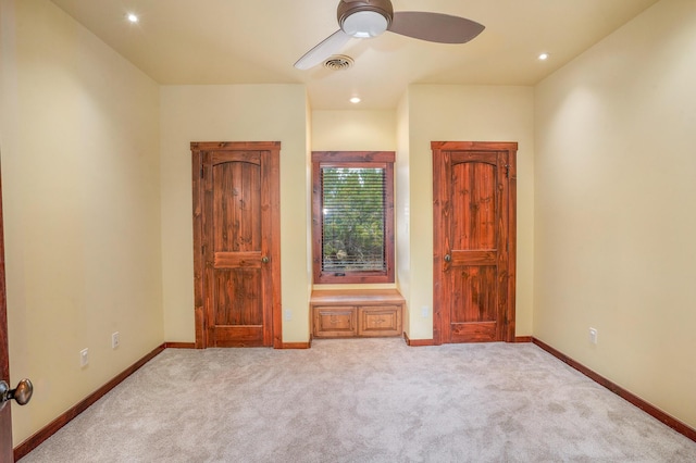 unfurnished bedroom with recessed lighting, visible vents, carpet flooring, and baseboards