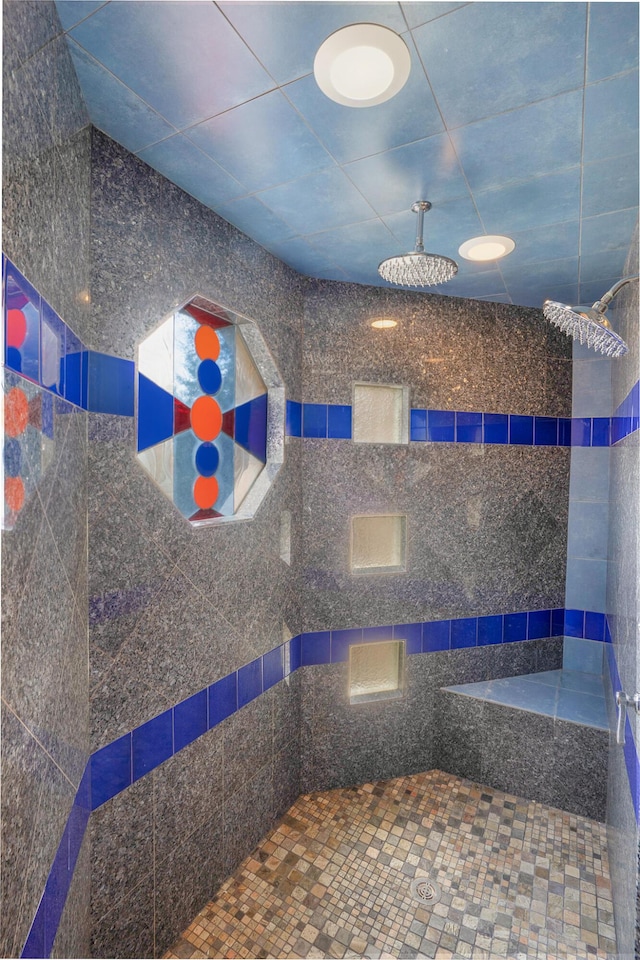 bathroom with tiled shower