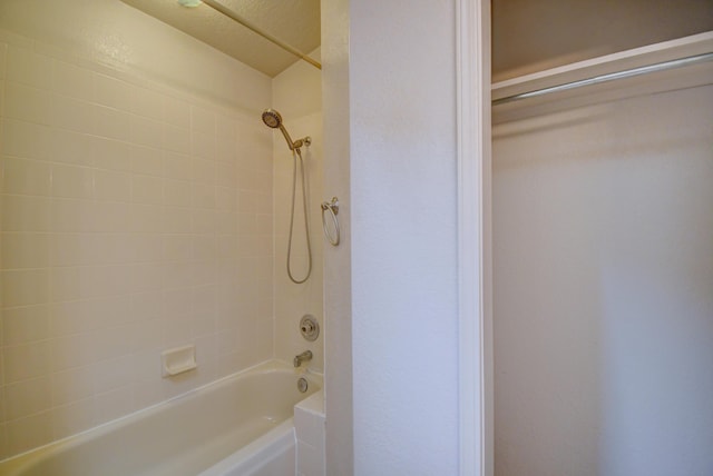 bathroom featuring a skylight, visible vents, and a sink