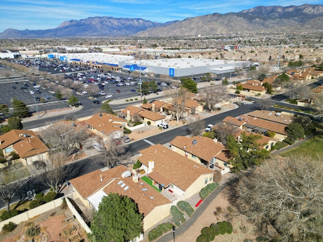 aerial view featuring a mountain view and a residential view