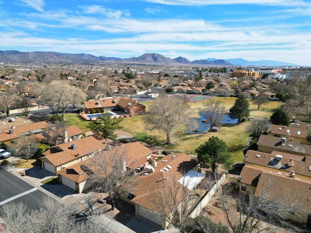 bird's eye view featuring a mountain view and a residential view