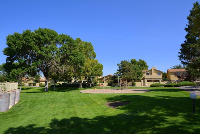 view of yard featuring playground community